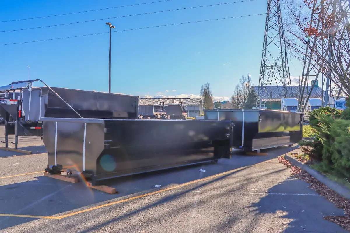 Roll-off dumpster ready for waste disposal at job site for 15 Yard Dumpster Rental in Spring Hill